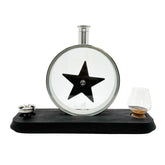 The classic Stainless Steel Porthole Infuser Set, featuring the charred oak star insert, two tasting glasses, and a wooden display stand on a white background.