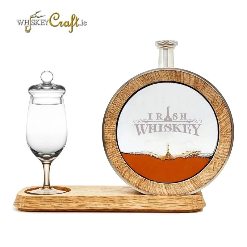 Irish Whiskey — A branded circular decanter with a tasting glass