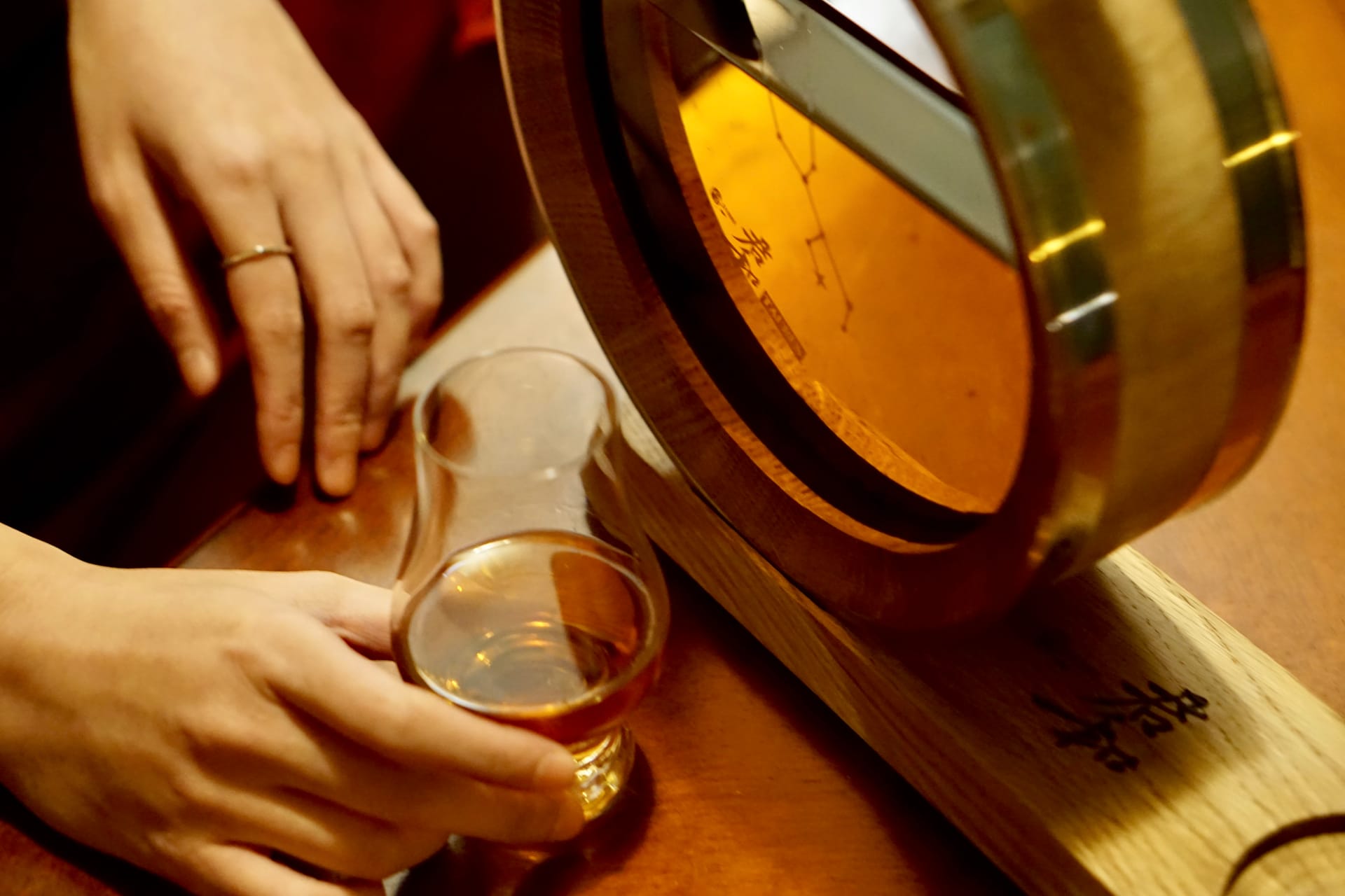 Tasting spirits beside the 500ml oak barrel
