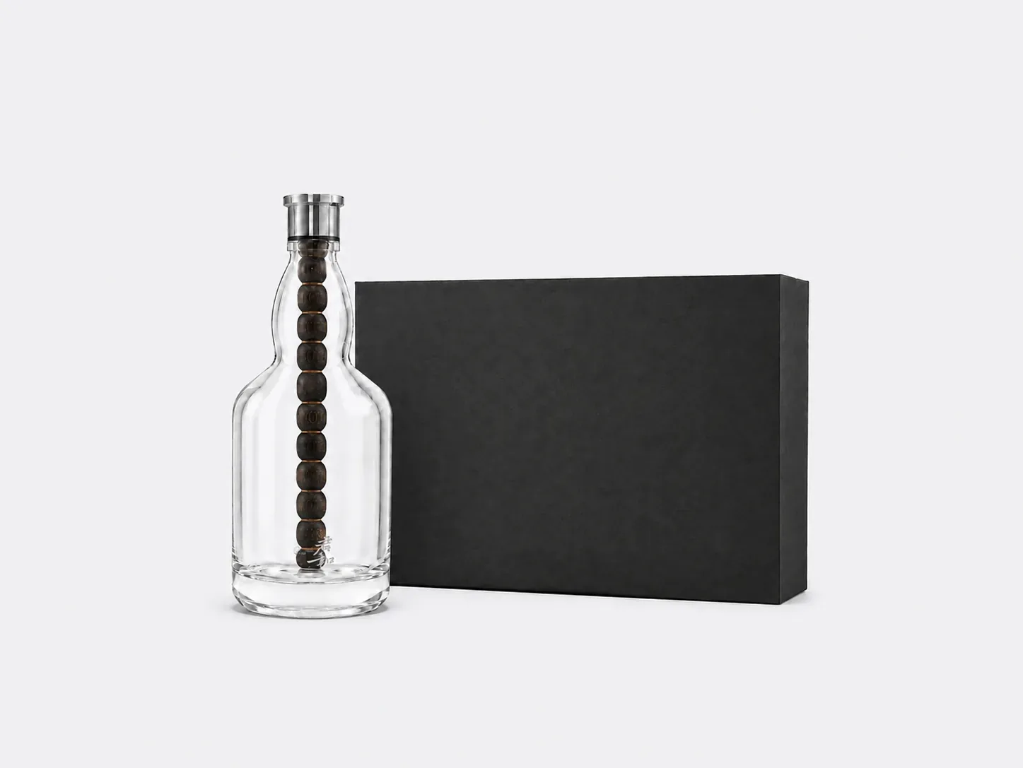 Aging Bottle with its black gift box