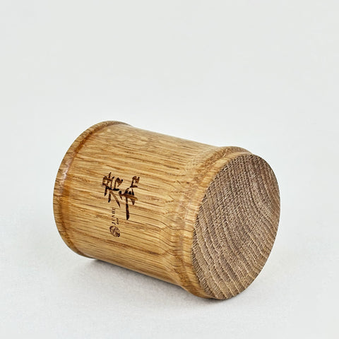 Side pictures of straight oak whiskey tumblers.