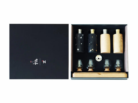 It shows four wine glasses and four small wine glasses in the gift box, as well as matching oak bases.