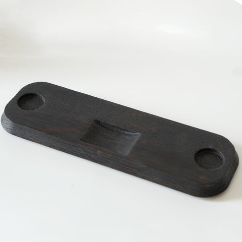 The oak base of the Stainless Steel Porthole Infuser Set. 