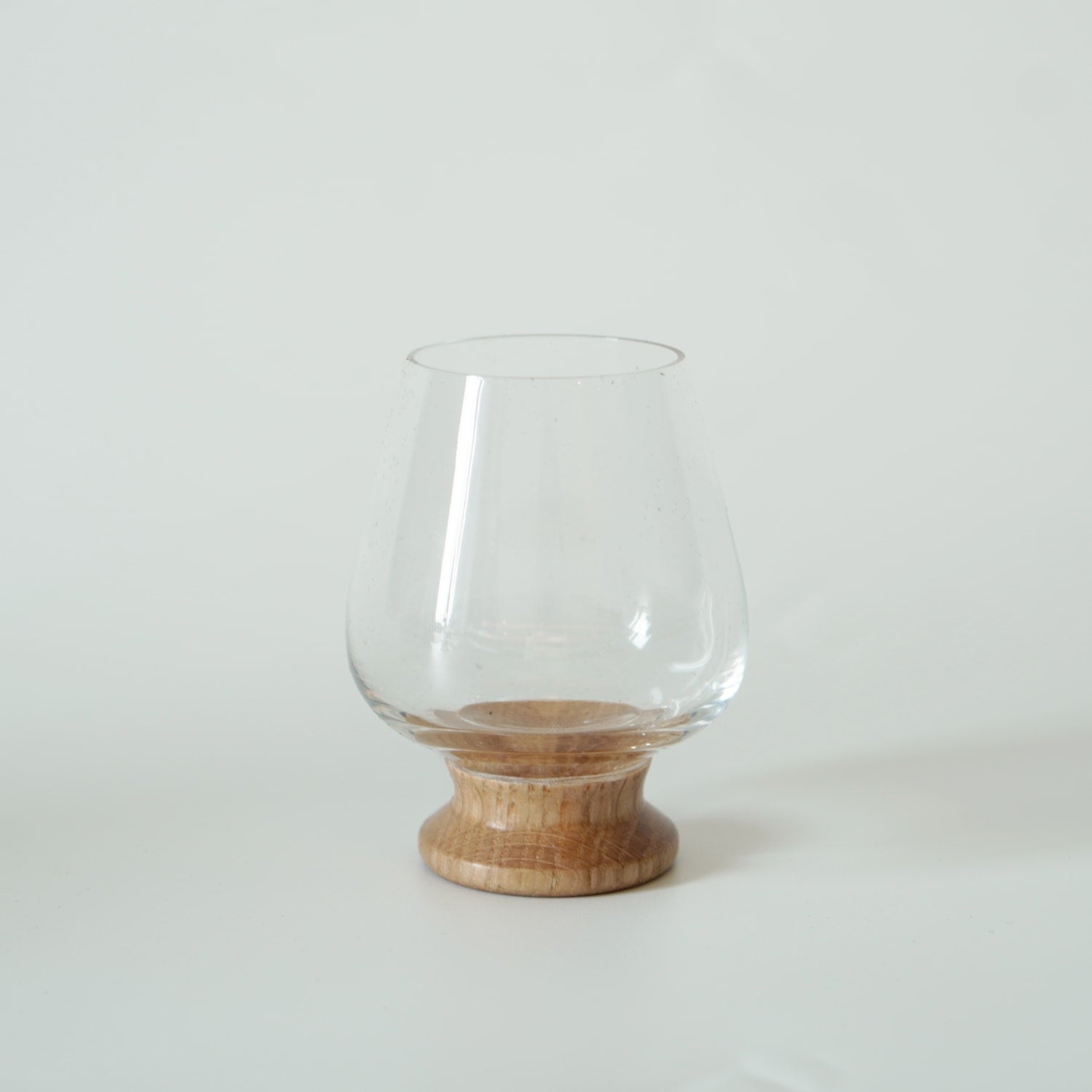 The small wine glass in the accessories of the Stainless Steel Porthole Infuser Set. 
