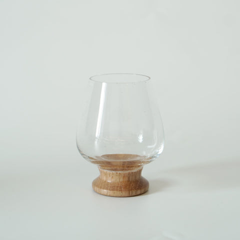 The small wine glass in the accessories of the Stainless Steel Porthole Infuser Set. 